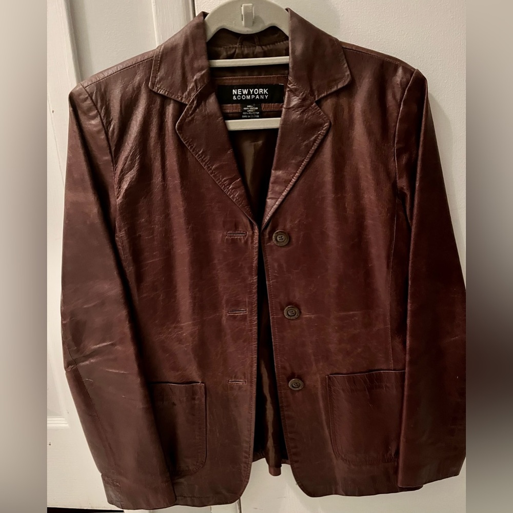 New York & Company Brown leather jacket. Size small. Used. Good condition.